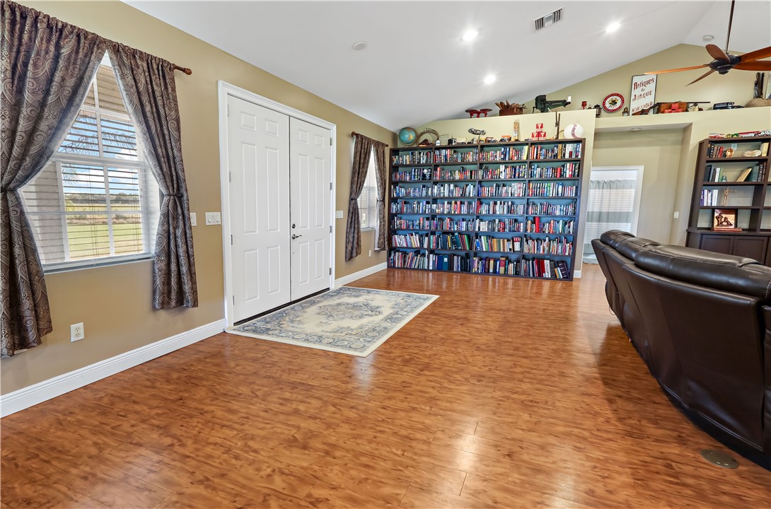 6045 21st Street Southwest Vero Beach, FL 32968 - Photo 30 of 36 a view of livingroom with furniture and staircase