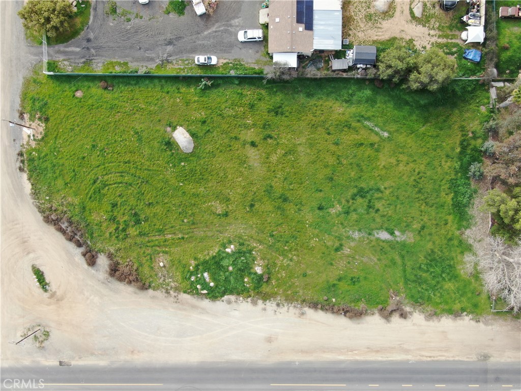 0 Chade Menifee, CA 92584 - Photo 2 of 17 a view of a garden with a bench