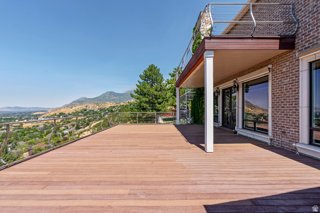 4093 North Imperial Way Provo, UT 84604 - Photo 83 of 96 Spacious outdoor deck featuring wood-finish flooring, cable railing, and a spiral staircase