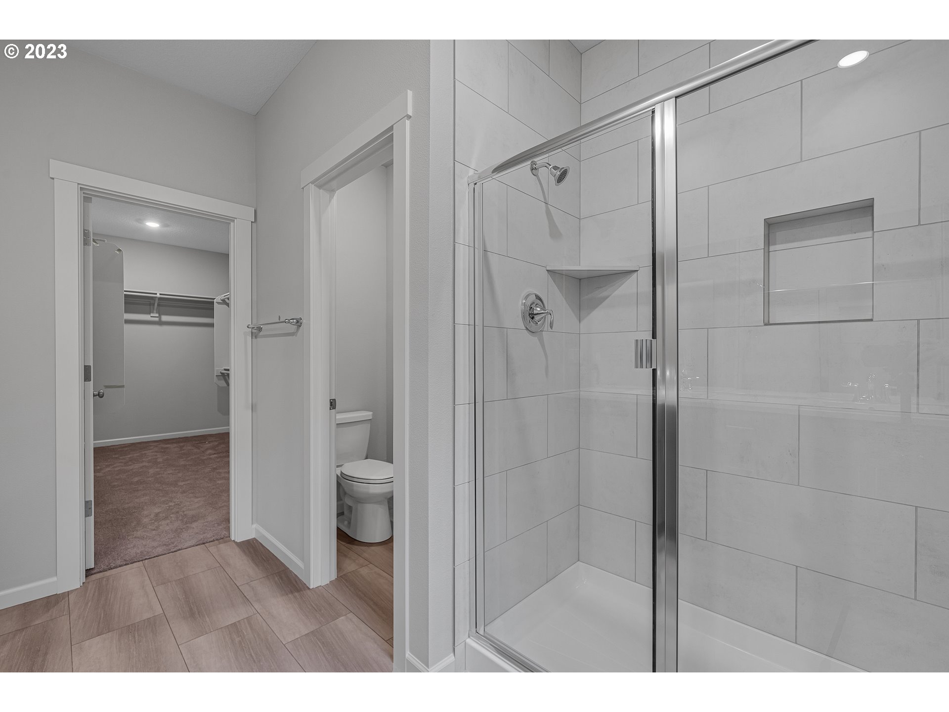 2609 South 4th Way Ridgefield, WA 98642 - Photo 18 of 25 a bathroom with a shower and a toilet