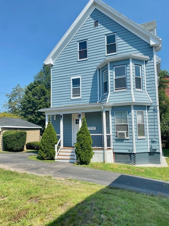 51 Walnut Street Lynn, MA 01905 - Photo 1 of 37 a front view of a house with a yard