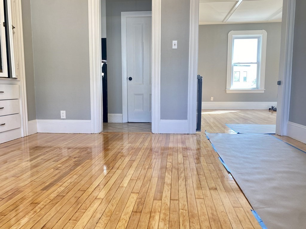 51 Walnut Street Lynn, MA 01905 - Photo 19 of 37 a view of empty room with wooden floor