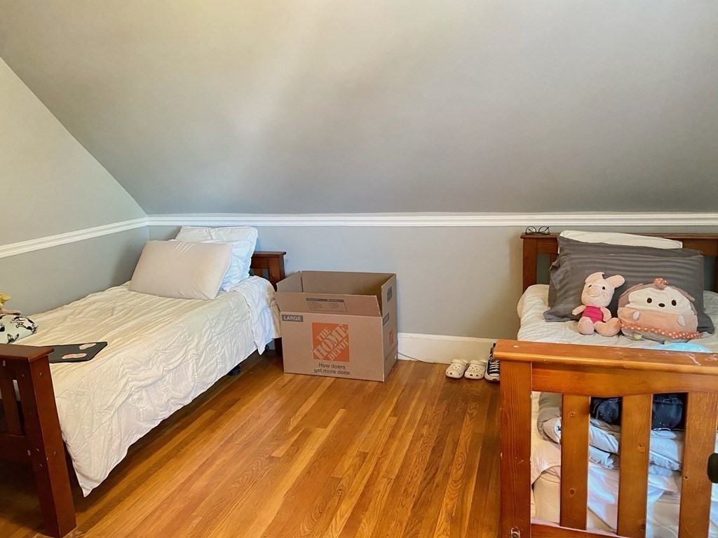 51 Walnut Street Lynn, MA 01905 - Photo 28 of 37 a bedroom with a bed and closet