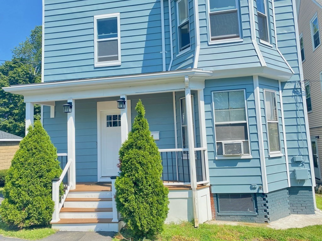 51 Walnut Street Lynn, MA 01905 - Photo 4 of 37 a front view of a house having yard