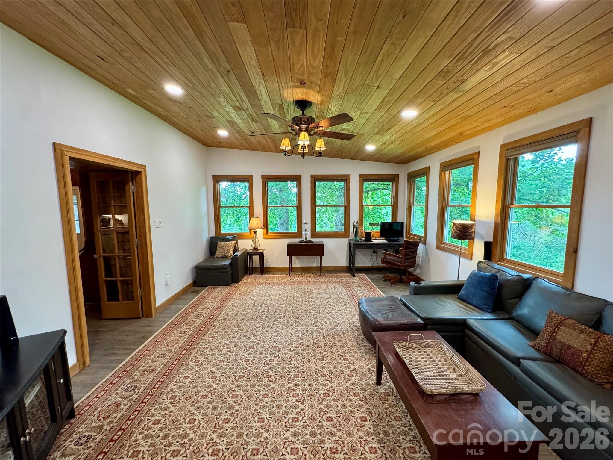 282 Calhoun Trail Rutherfordton, NC 28139 - Photo 24 of 48 a living room with furniture and a flat screen tv