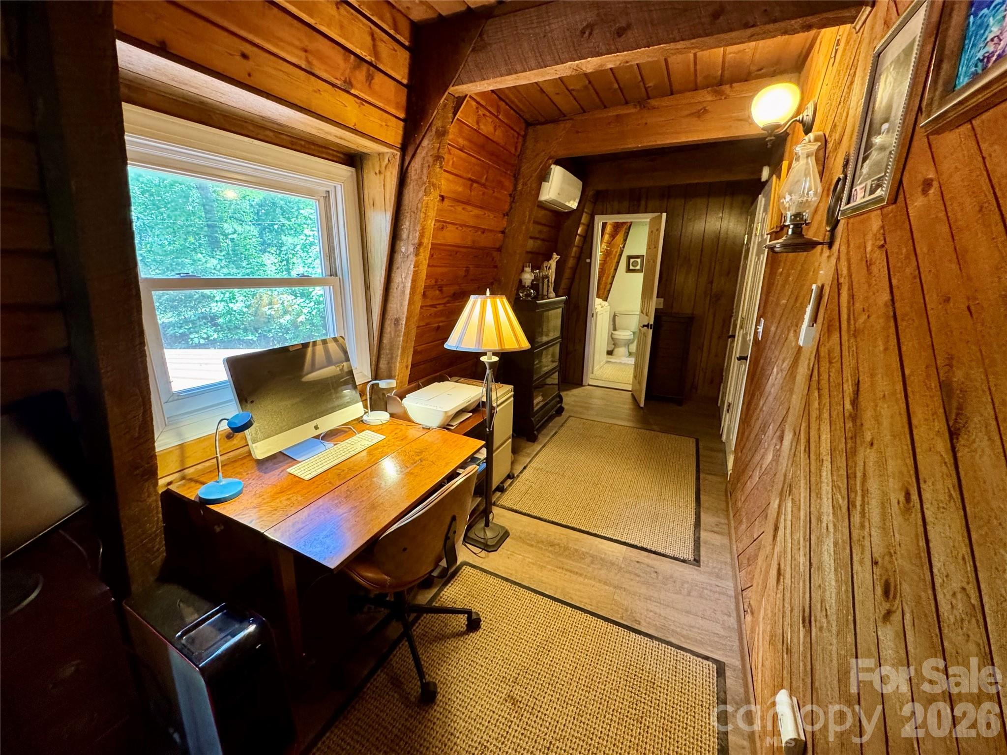 282 Calhoun Trail Rutherfordton, NC 28139 - Photo 27 of 48 a room with furniture and wooden floor