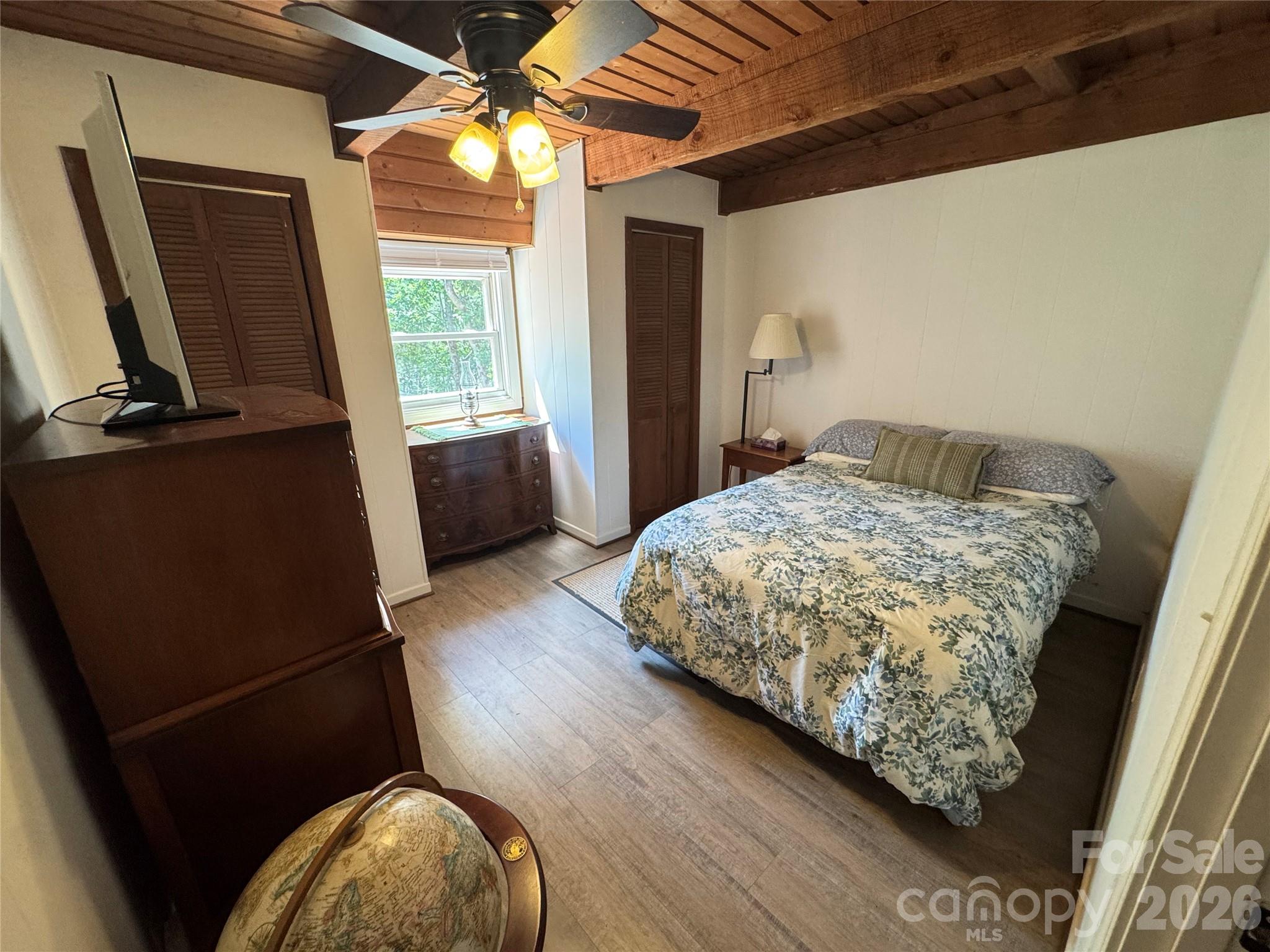 282 Calhoun Trail Rutherfordton, NC 28139 - Photo 29 of 48 a bedroom with a bed and a mirror