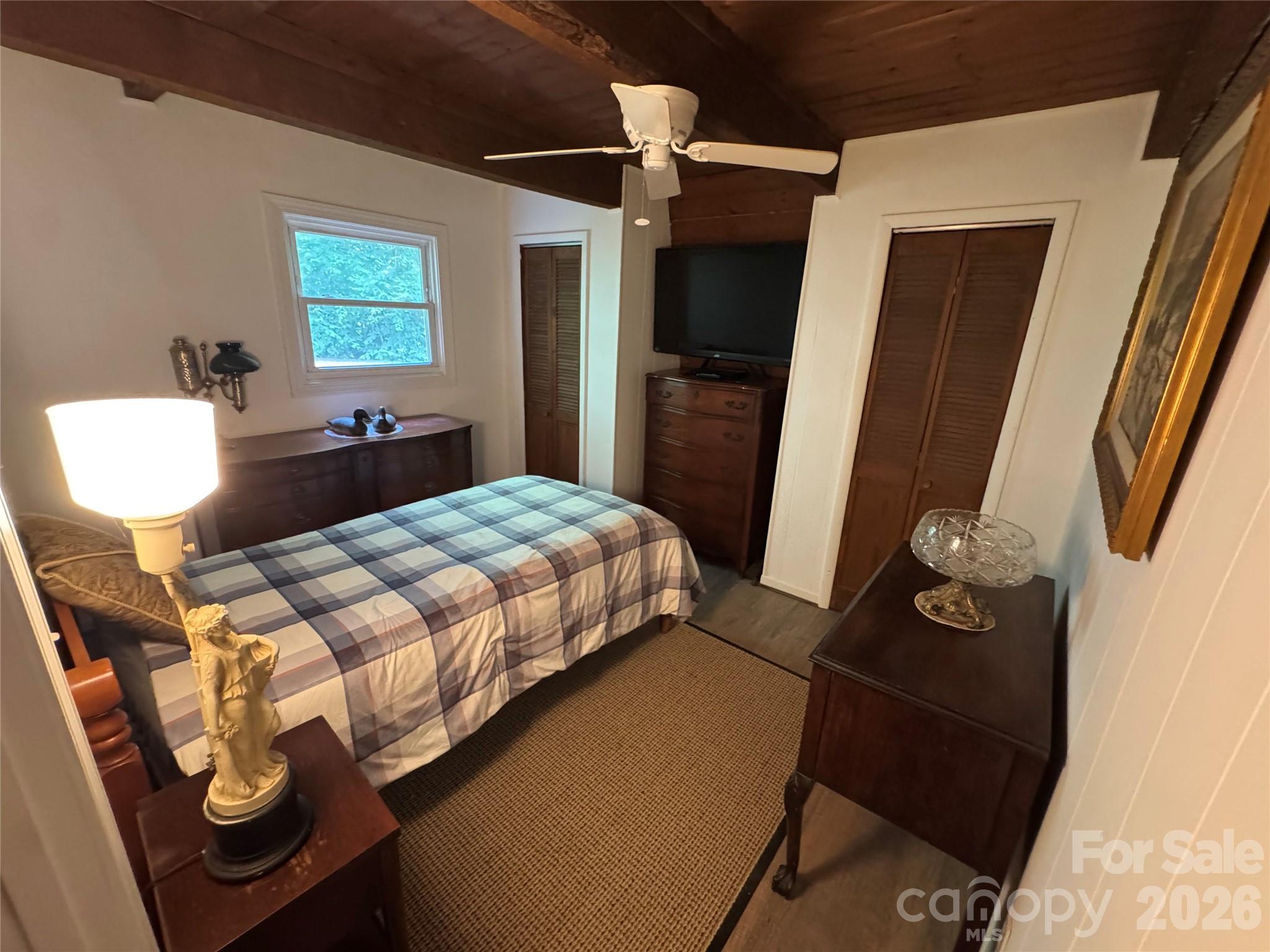 282 Calhoun Trail Rutherfordton, NC 28139 - Photo 30 of 48 a bedroom with a bed and dresser