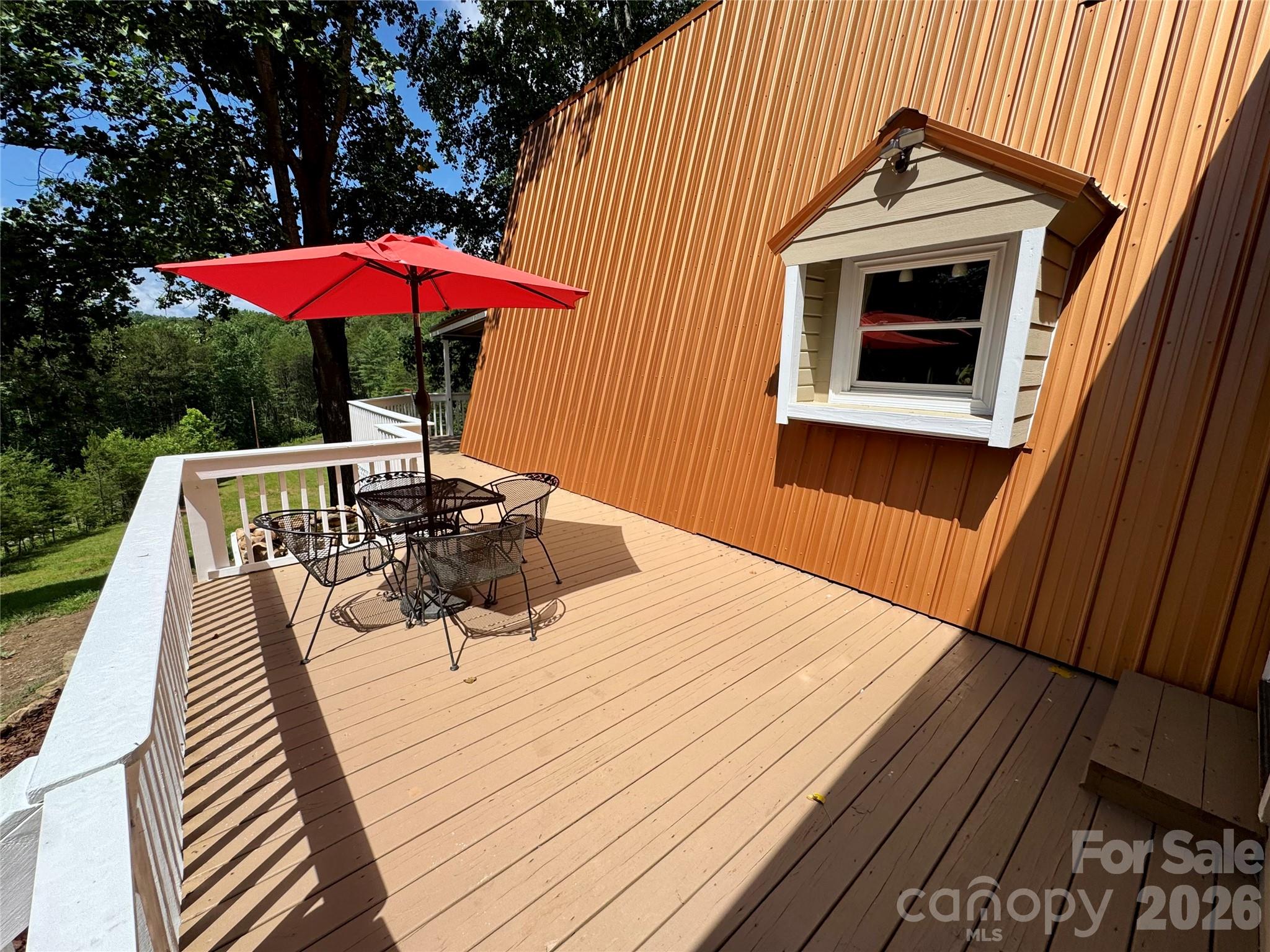 282 Calhoun Trail Rutherfordton, NC 28139 - Photo 36 of 48 a balcony view with a seating space
