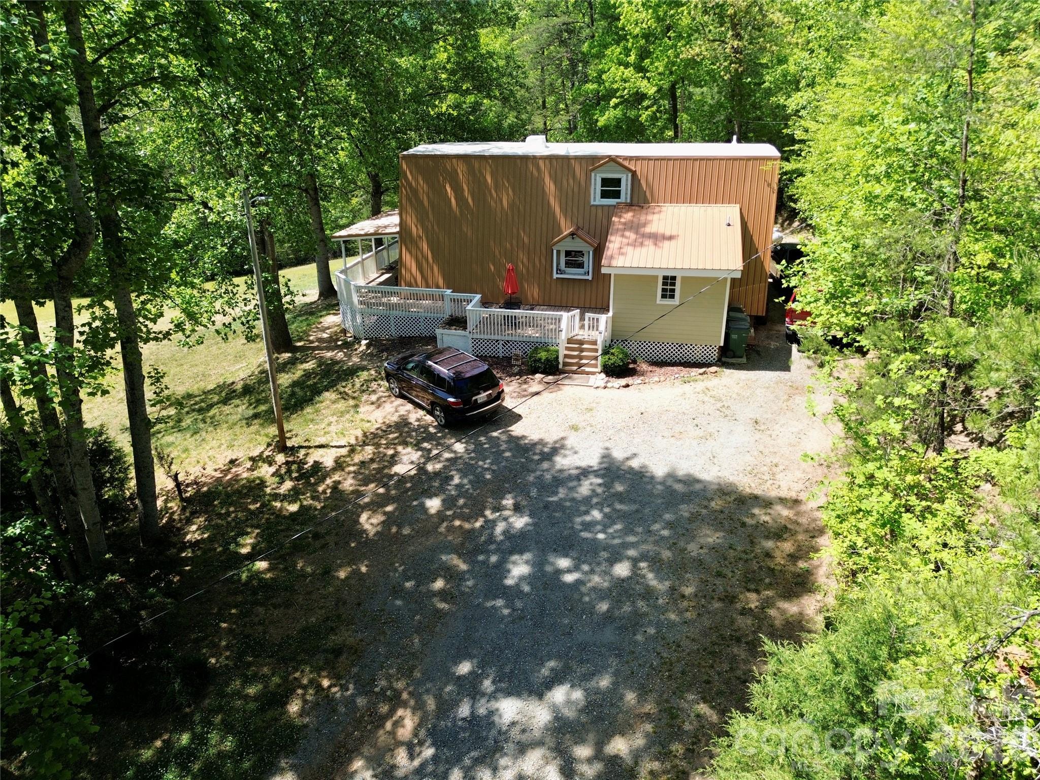 282 Calhoun Trail Rutherfordton, NC 28139 - Photo 5 of 48 a view of backyard with a tree