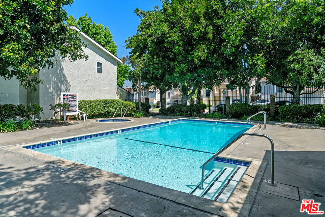 12309 Clover Road Pacoima, CA 91331 - Photo 14 of 15 a view of a backyard with a swimming pool
