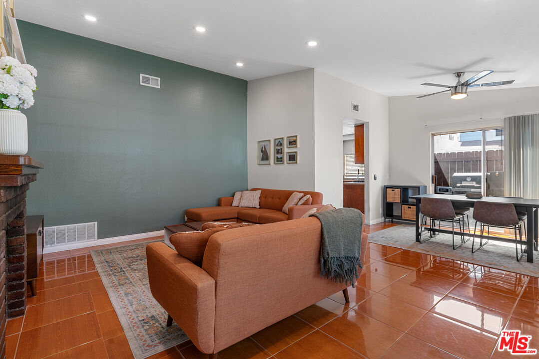 12309 Clover Road Pacoima, CA 91331 - Photo 4 of 15 a living room with furniture and a rug