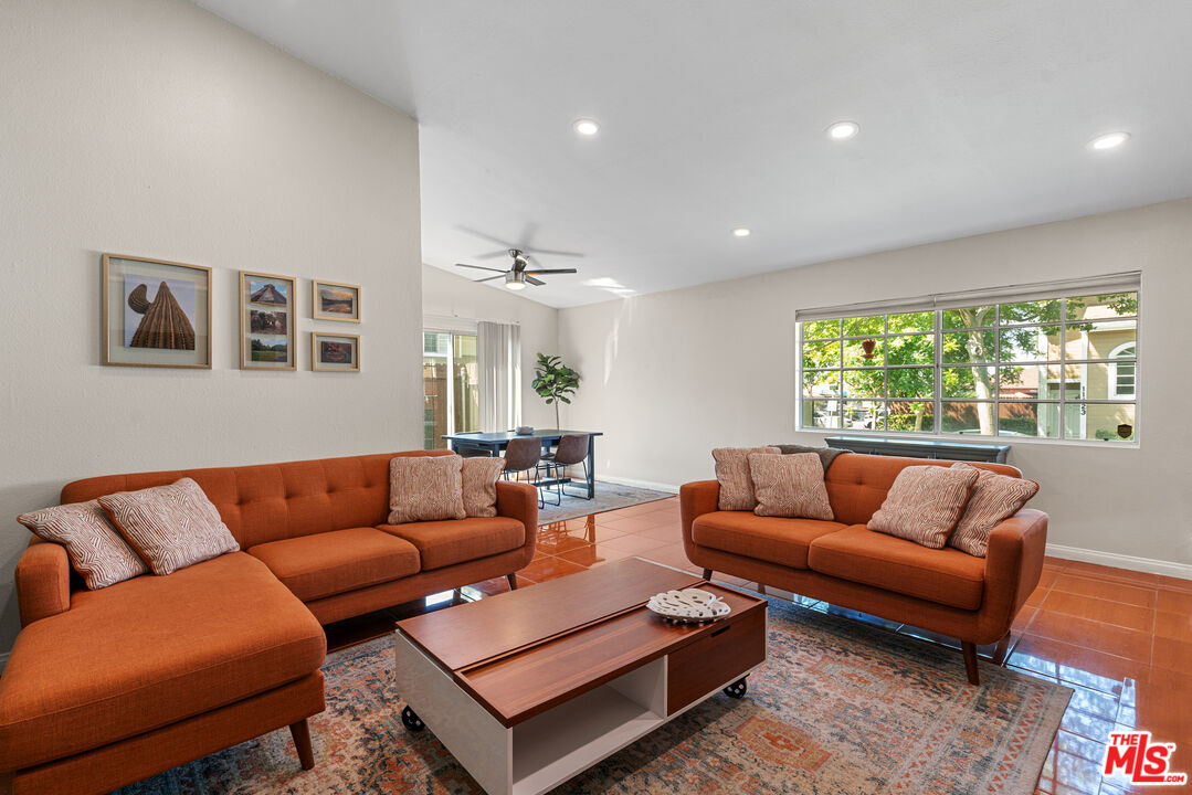 12309 Clover Road Pacoima, CA 91331 - Photo 5 of 15 a living room with furniture and a window