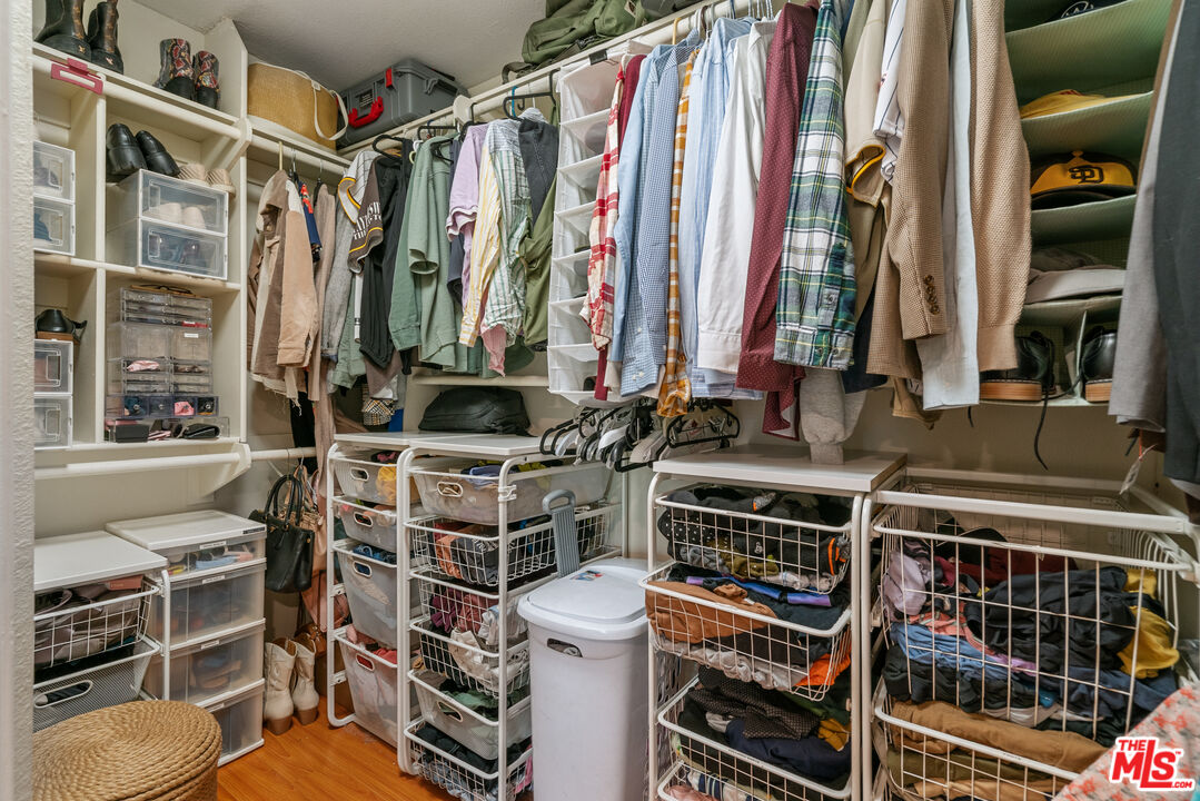 12309 Clover Road Pacoima, CA 91331 - Photo 10 of 15 a blue and white house with black walls and a sink