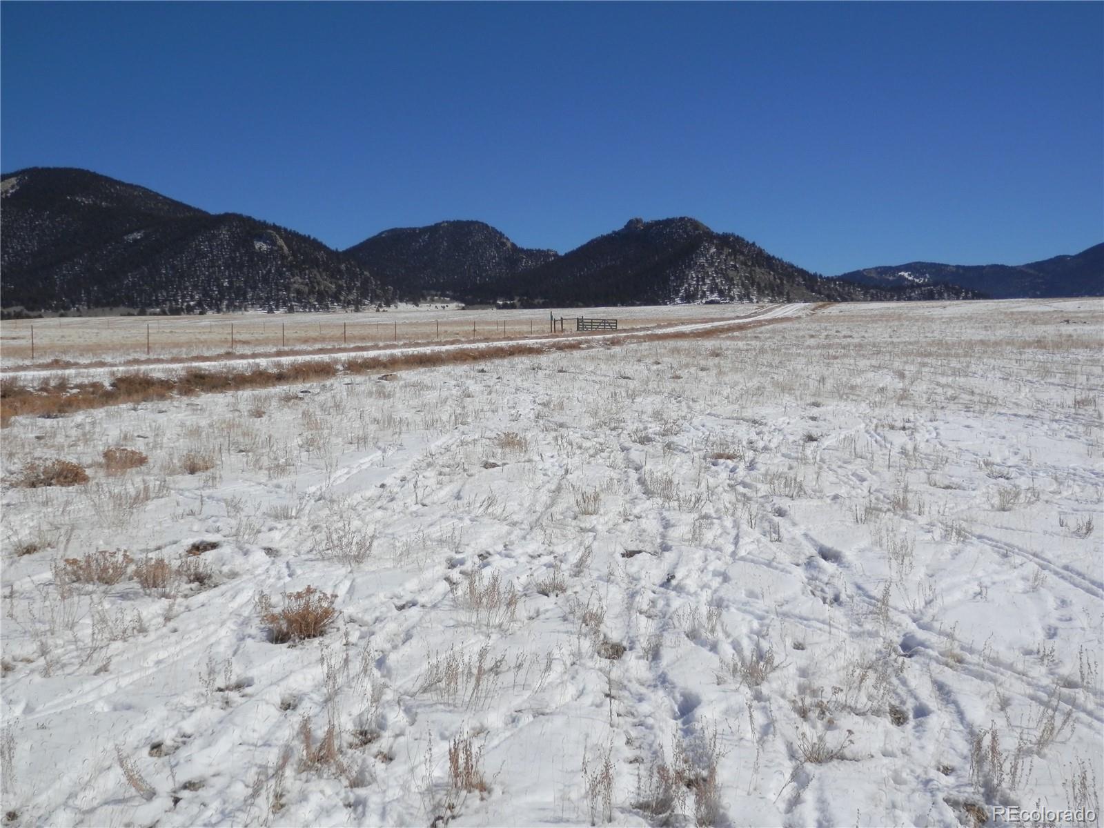 6744 Mesa Road Hartsel, CO 80449 - Photo 11 of 23 a view of mountain with sunset in background