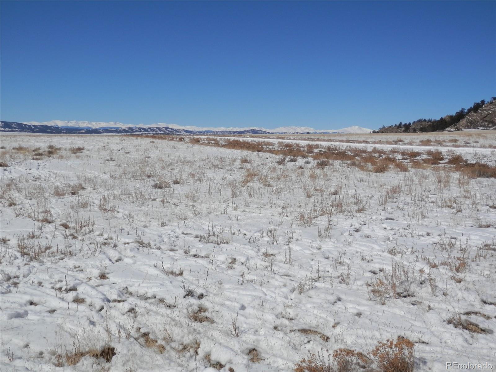 6744 Mesa Road Hartsel, CO 80449 - Photo 8 of 23 a view of beach and mountain in the back