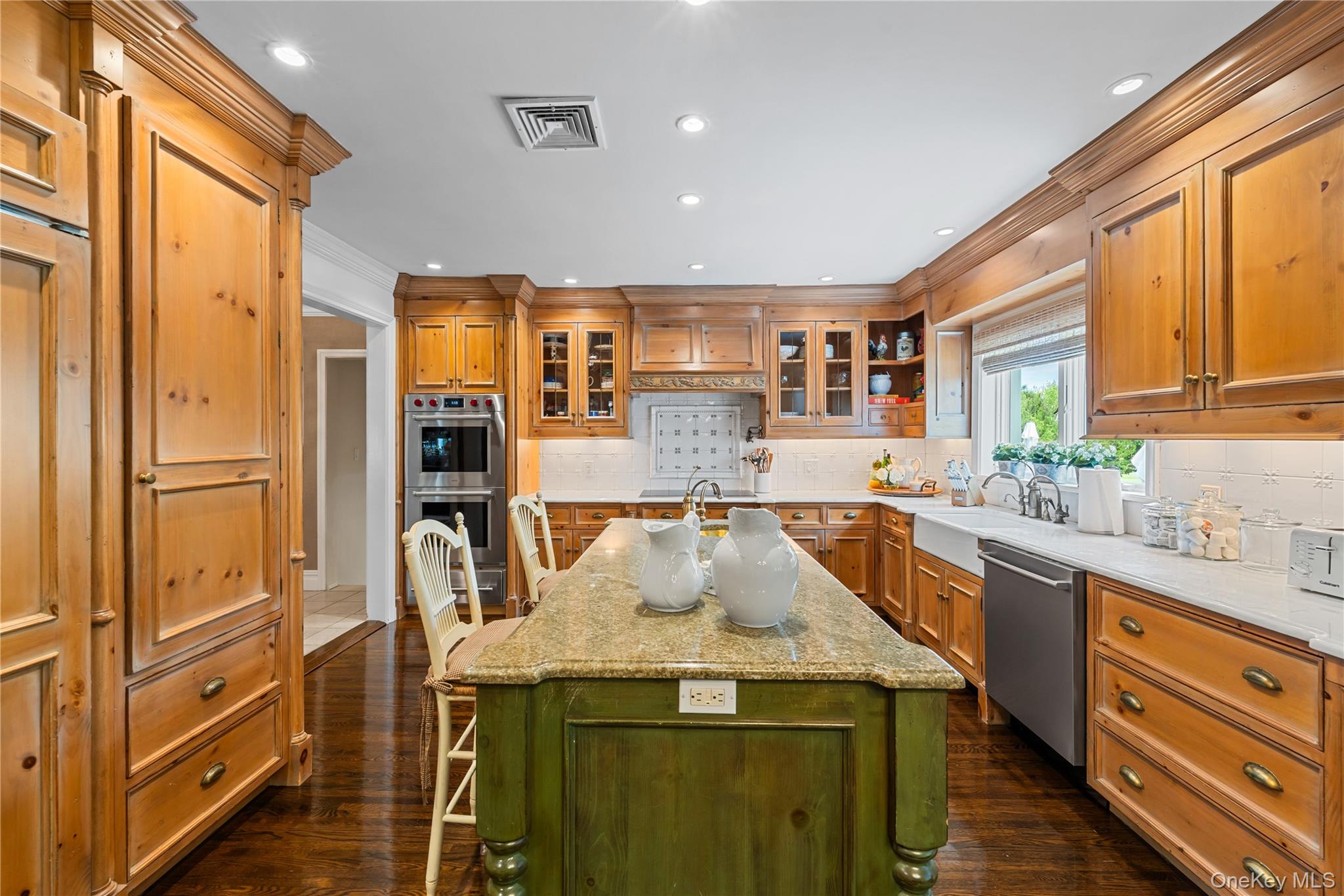 11 Hickory Road Woodmere, NY 11598 - Photo 13 of 50 EAT IN KITCHEN WITH CUSTOM WOOD CABINETS/NEW APPLIANCES