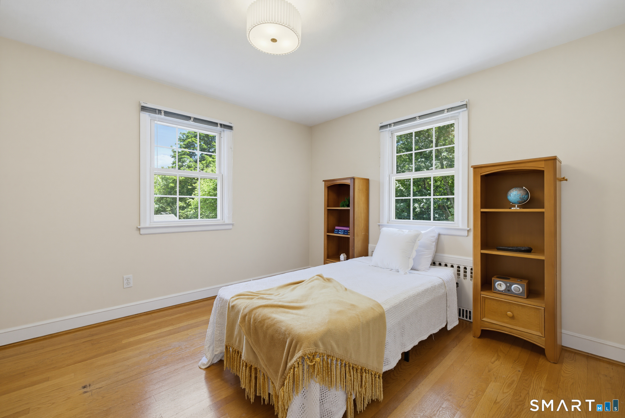 224 Spring Street Manchester, CT 06040 - Photo 20 of 39 a bedroom with a bed and a window