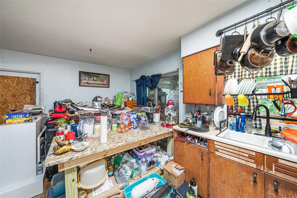 1580 Tuscola Road Clearwater, FL 33756 - Photo 11 of 15 a view of storage and utility room