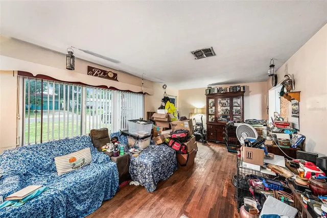 a living room with furniture and a window