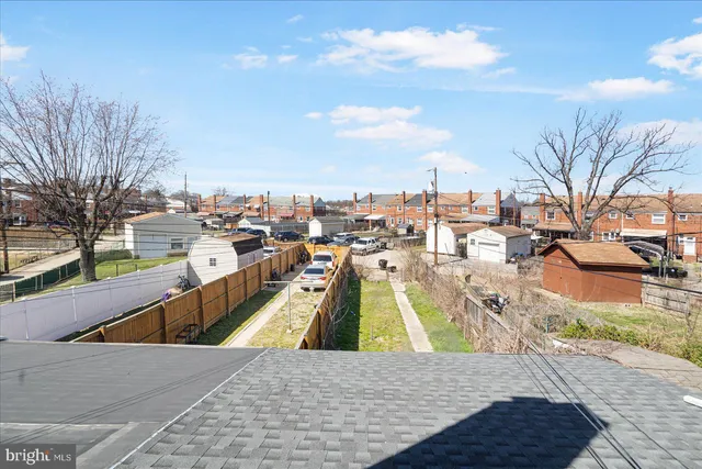 a view of a swimming pool with a lounge chairs