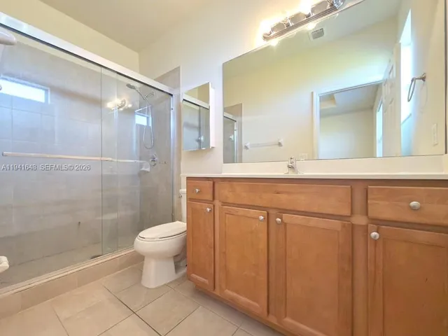 an empty room with closet area