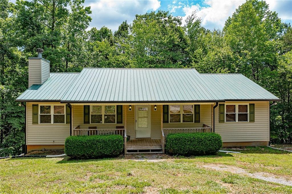 1291 Davis Road West Fairmount, GA 30139 - Photo 1 of 1 a view of a house with a yard