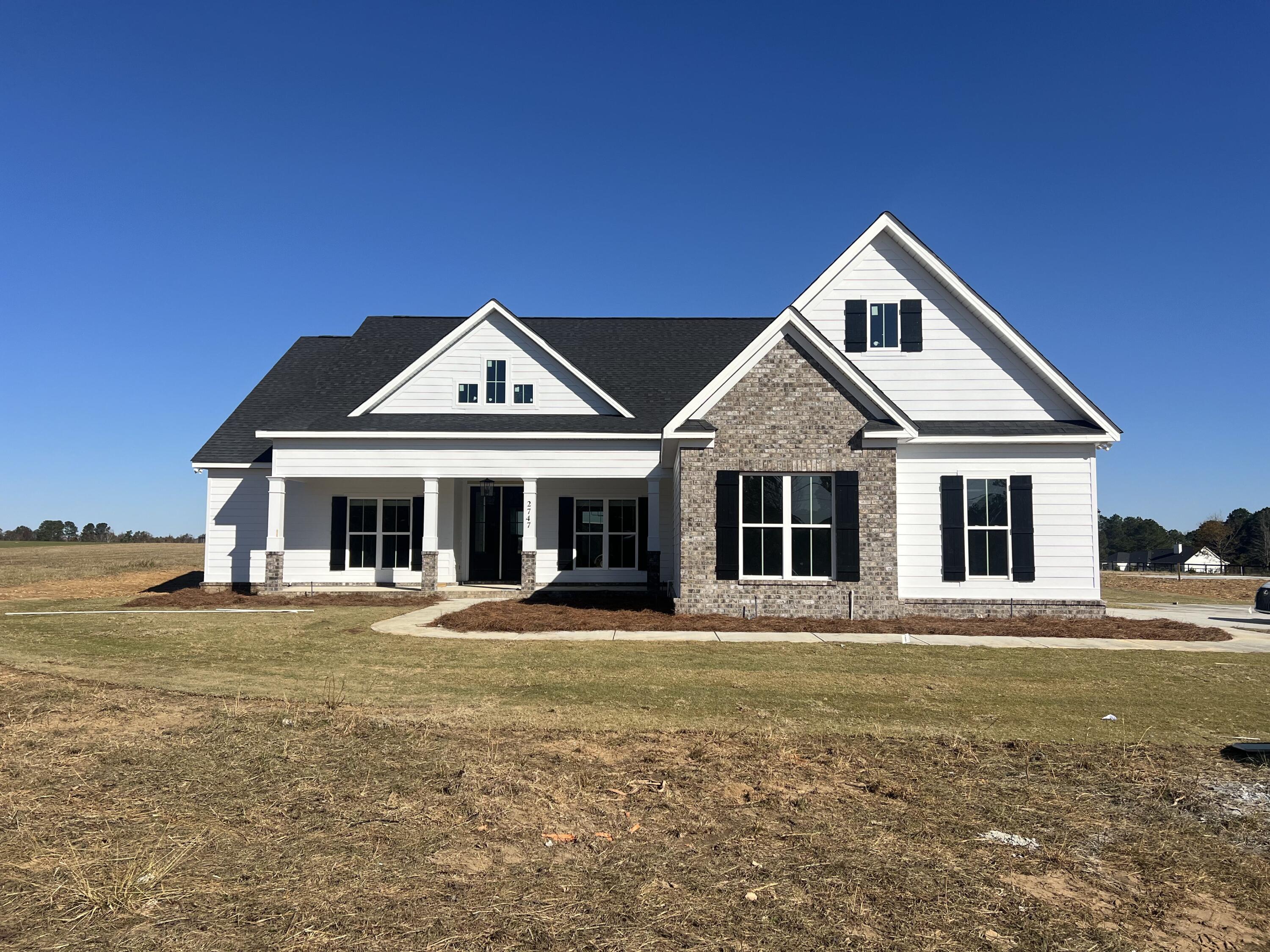 2747 Storm Branch Road Beech Island, SC 29842 - Photo 1 of 38 a front view of a house with a yard