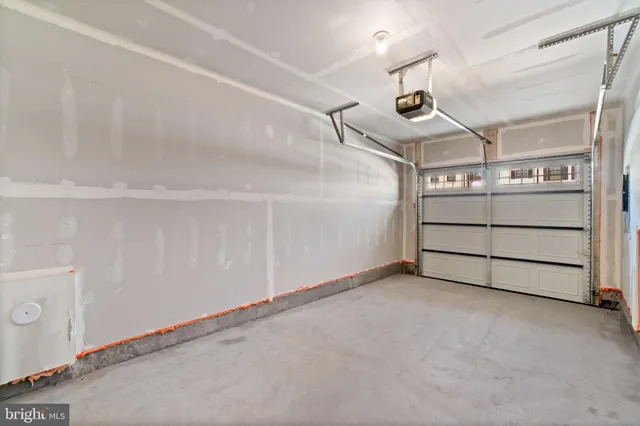 a kitchen with stainless steel appliances a refrigerator and a stove top oven