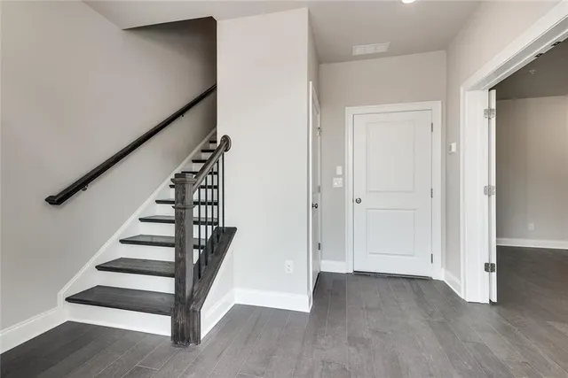 a view of entryway with wooden floor
