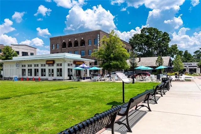 a view of a house with a big yard