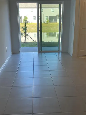 a view of a big yard with an outdoor space