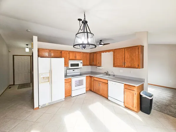 a bathroom with a sink toilet and mirror