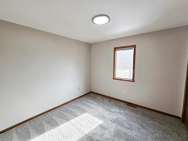 a view of a livingroom with a fireplace