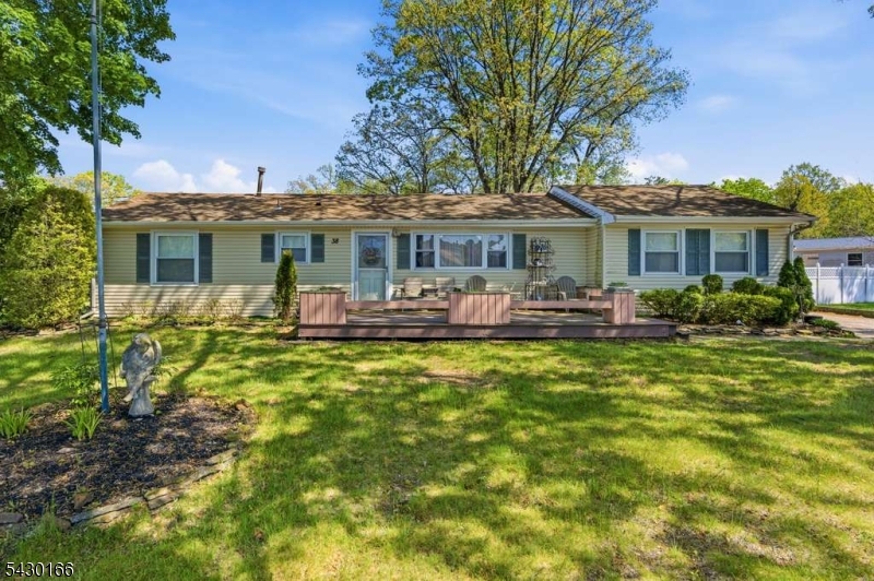 38 Clark Drive Howell, NJ 07731 - Photo 3 of 15 a front view of house with yard entertaining space and seating area