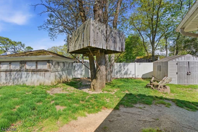 38 Clark Drive Howell, NJ 07731 - Photo 8 of 15 a view of a house with backyard and a tree