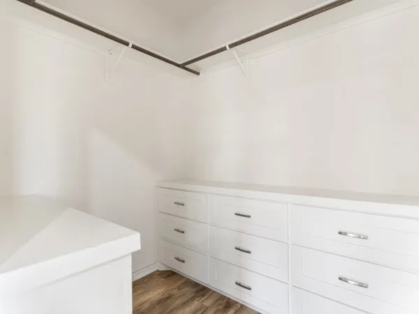 a view of a storage and utility room with closet