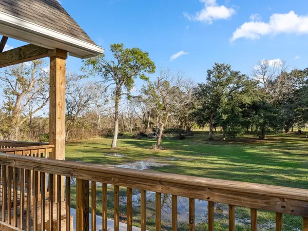 a view of balcony with a swimming pool