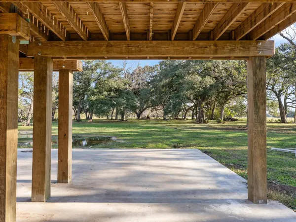 a view of swimming pool with a backyard