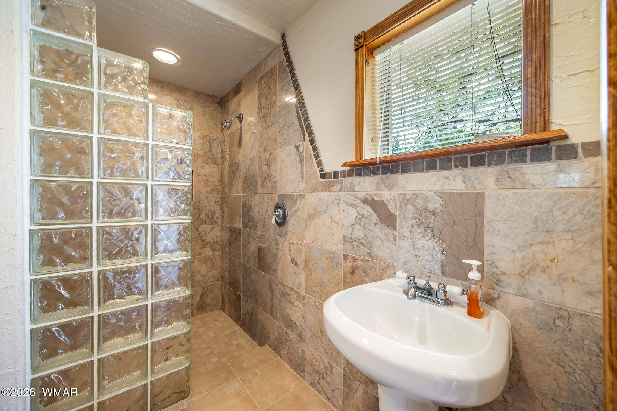2937 Ransack Road Overgaard, AZ 85933 - Photo 25 of 34 a bathroom with a sink and a mirror