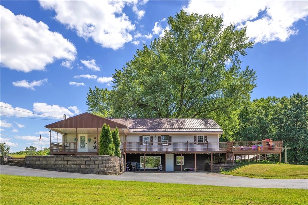 1425 Old State Road New Castle, PA 16101 - Photo 1 of 37 Set on 4.5 peaceful acres, this ranch home offers a rare blend of privacy and natural beauty.