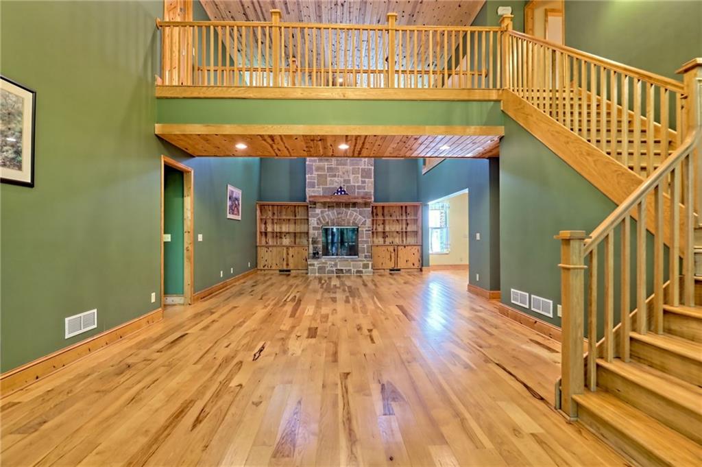 876 Whitetail Trail Clayton, GA 30525 - Photo 24 of 85 a view of a balcony with wooden floor