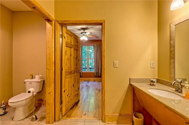 a view of a bathroom with a shower and a door