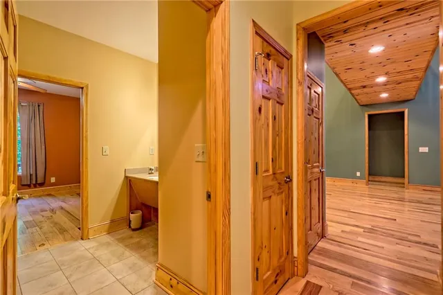 a large kitchen with stainless steel appliances granite countertop a granite counter top and a stove top oven