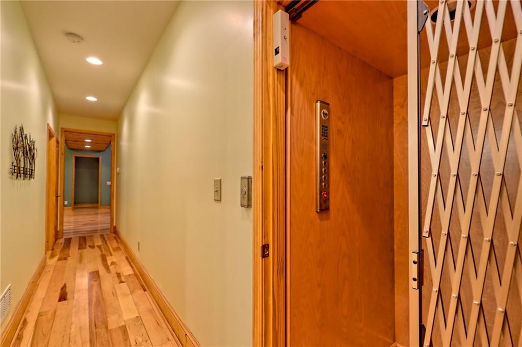 876 Whitetail Trail Clayton, GA 30525 - Photo 43 of 85 a view of a bathroom with shower and wooden floor