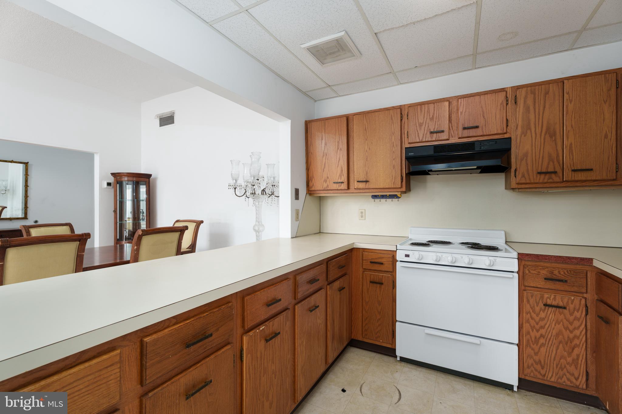 1 Markham Road, Unit 2C Princeton, NJ 08540 - Photo 12 of 23 a kitchen with stainless steel appliances granite countertop a sink a stove and cabinets