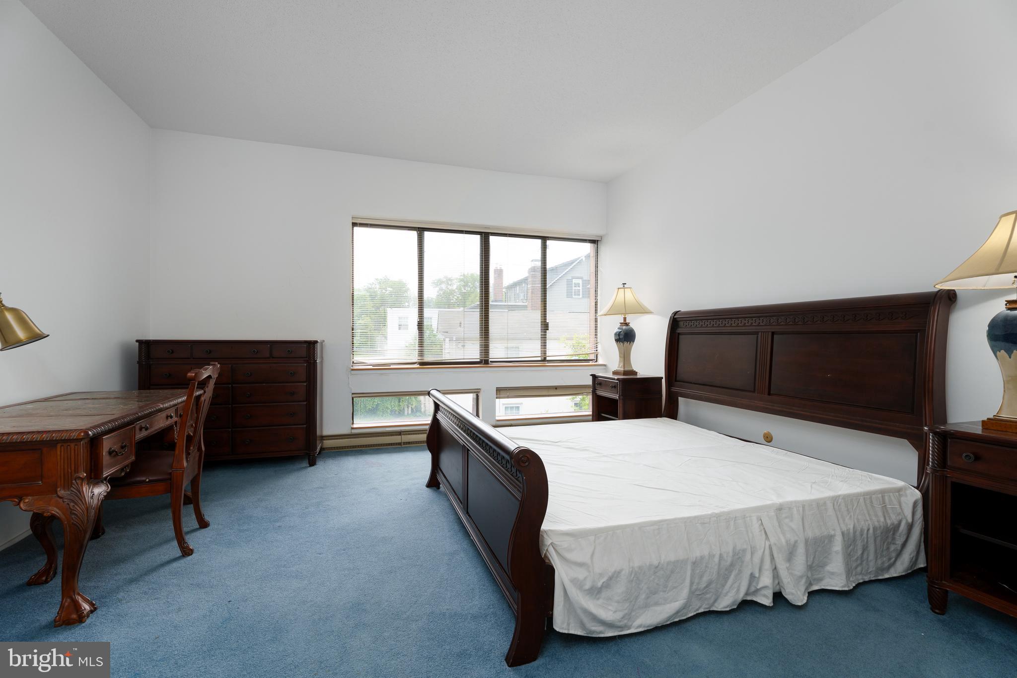 1 Markham Road, Unit 2C Princeton, NJ 08540 - Photo 15 of 23 a bedroom with a bed and a desk