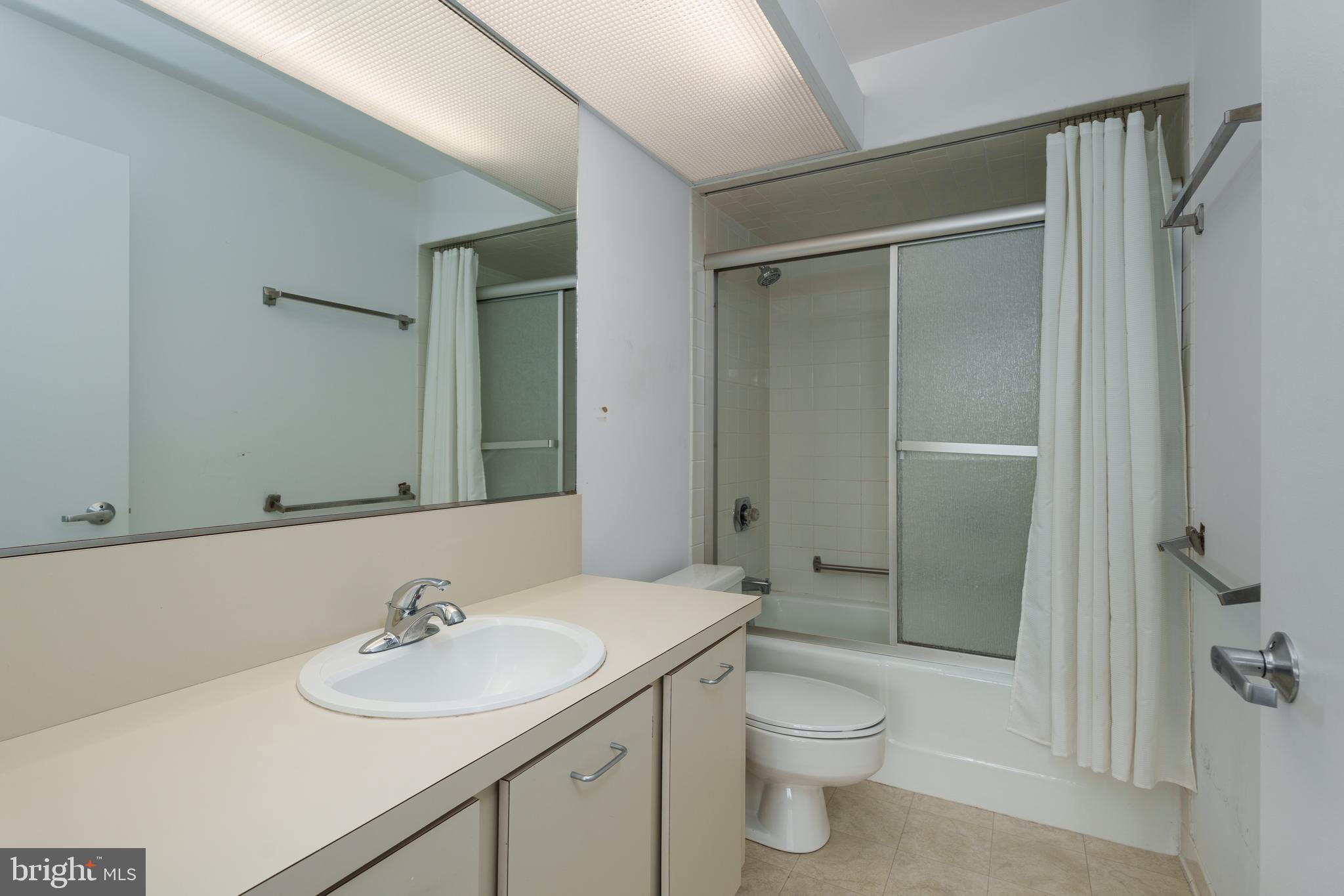 1 Markham Road, Unit 2C Princeton, NJ 08540 - Photo 16 of 23 a bathroom with a sink toilet and shower