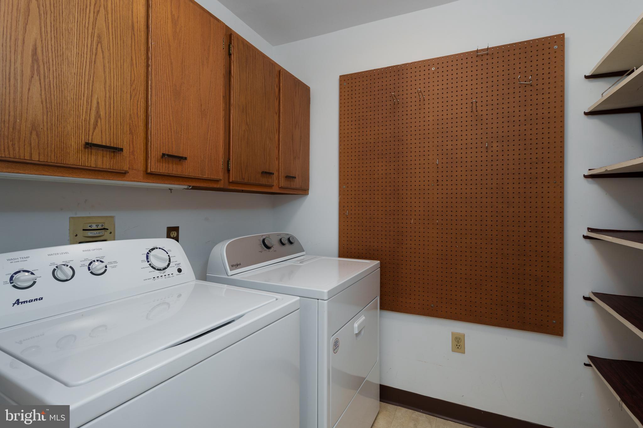 1 Markham Road, Unit 2C Princeton, NJ 08540 - Photo 21 of 23 a utility room with dryer and washer