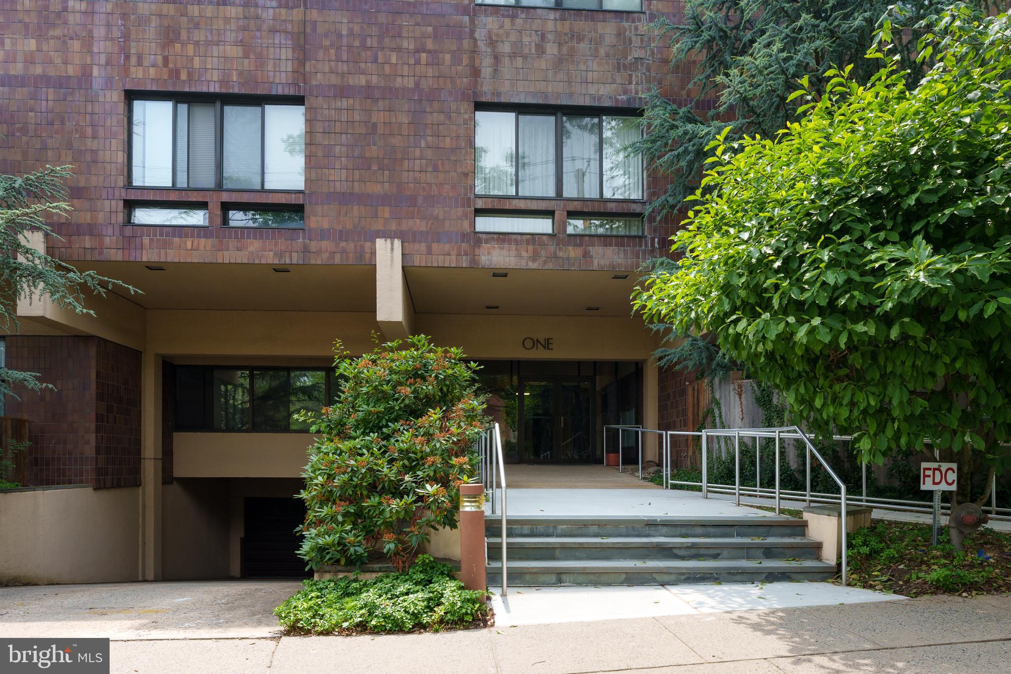 1 Markham Road, Unit 2C Princeton, NJ 08540 - Photo 22 of 23 a front view of a house with a garden